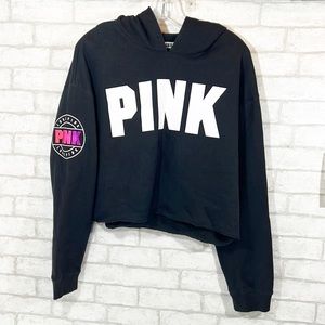 Pink Victoria’s Secret black spell out crop hoodie size Large